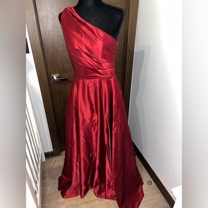 Red one shoulder gown